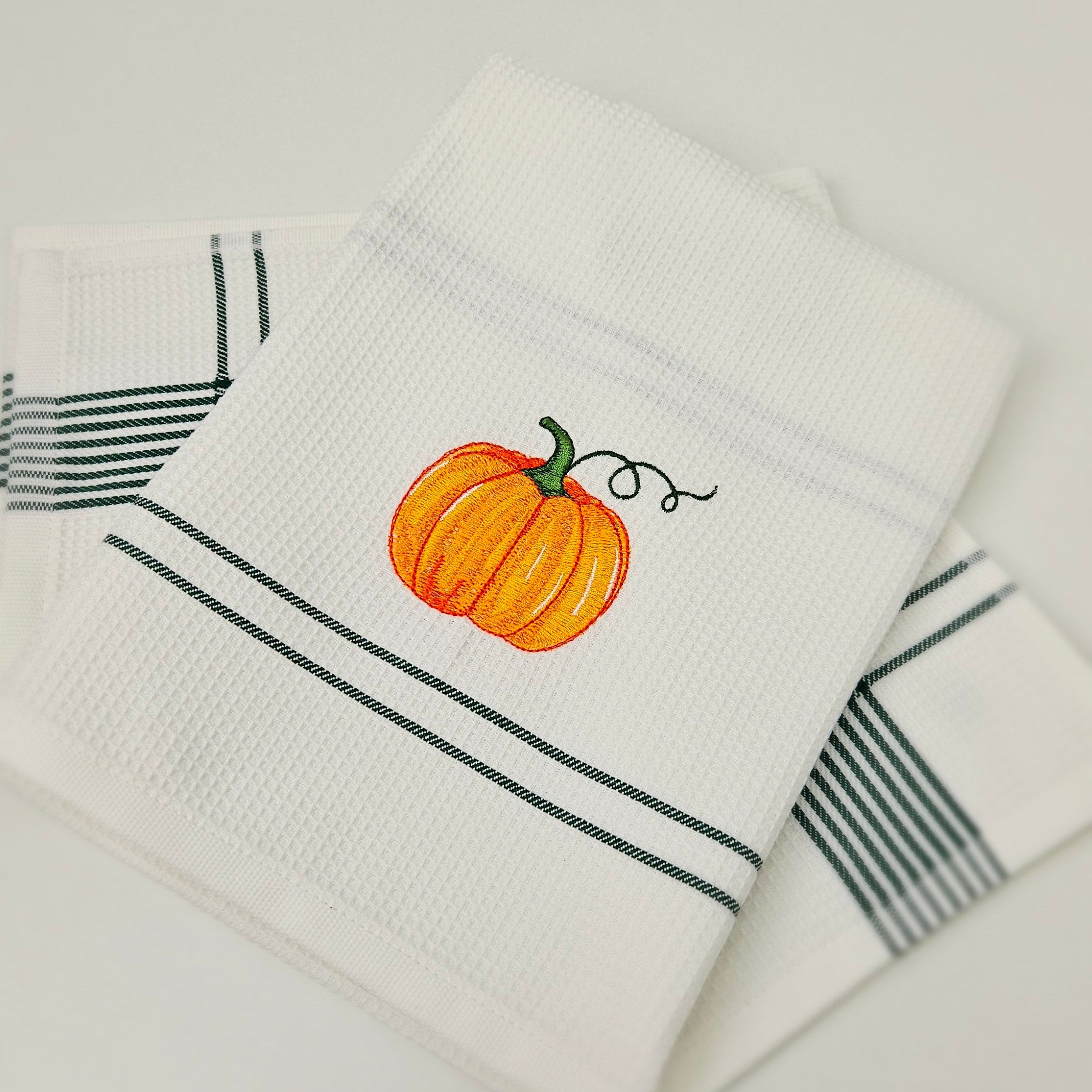 Embroidered kitchen towels - a white waffle weave classic with character