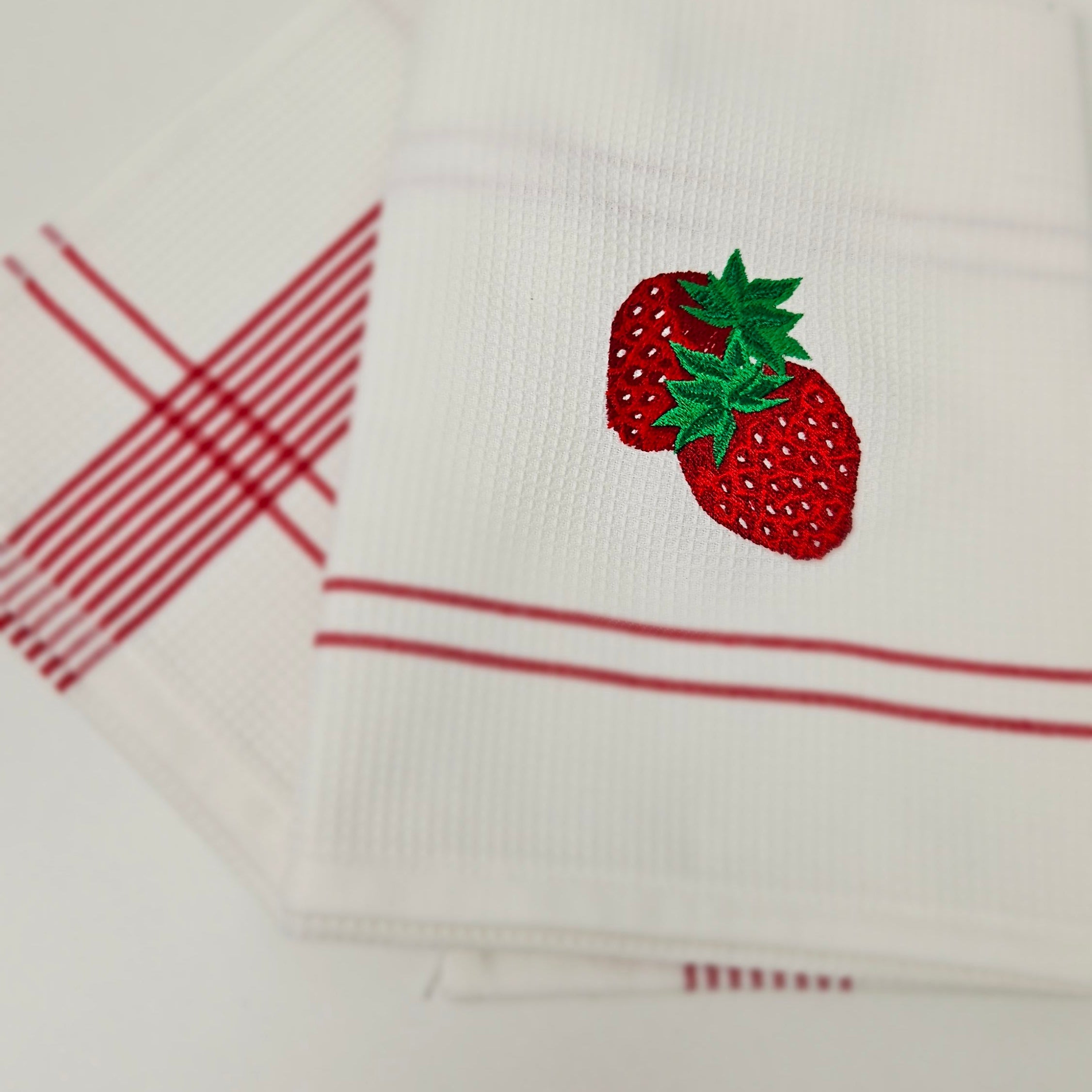 Embroidered kitchen towels - a white waffle weave classic with character